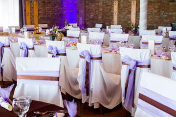 an image of tables setting at a luxury wedding hall