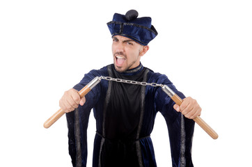 Martial arts master with nunchucks on white