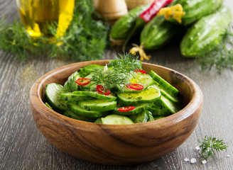 Salad of cucumber, sesame seeds and pepper.