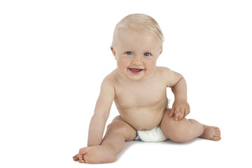 Happy baby crawling in diaper isolated on white