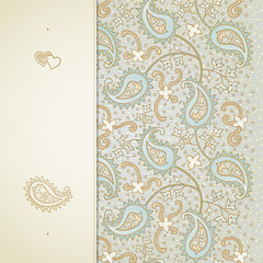 Vintage greeting card with swirls and floral motifs.