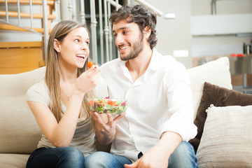 Couple eating a salad