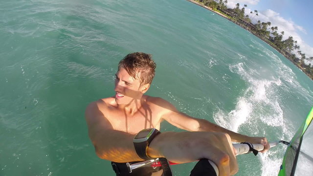 POV Young Active Man Windsurfing In Ocean