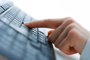 Close-up of typing female hands on keyboard