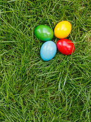 Colorful easter eggs in grass