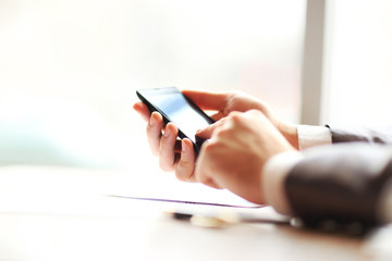 man working with modern devices, mobile phone.
