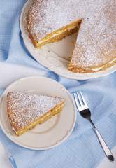 piece of carrot cake on white plate