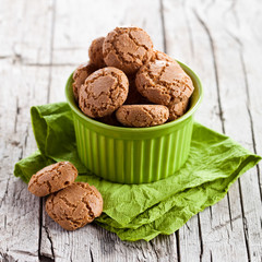meringue almond cookies in a green bowl