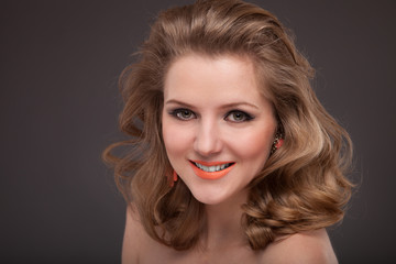 Naklejka premium Beautiful young woman with long brown hair. Pretty model