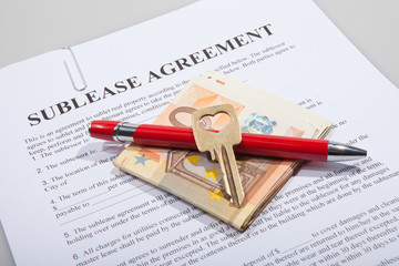 Sublease agreement with Euro notes golden key and pen