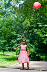 Little girl with balloon