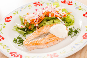 salmon steak with vegetables