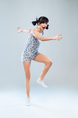 Funny girl in pajamas walks forward