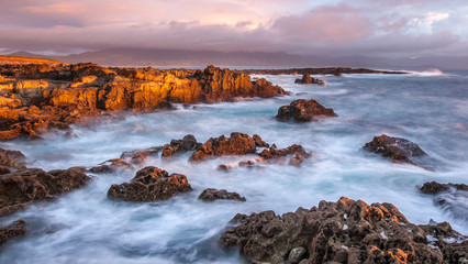 long exposure of a sunset at 10:00 pm on one of the longest day of the year on the rugged coastline of Kerry, Ireland