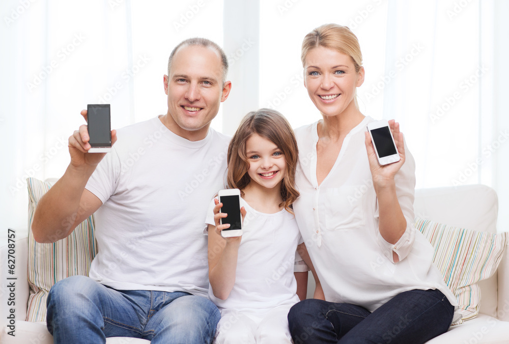 Canvas Prints parents and little girl with smartphones at home