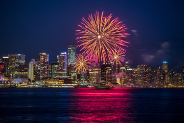 Celebration of Canada Day on July 1st with a colorful fireworks display in Vancouver, British Columbia, Canada.