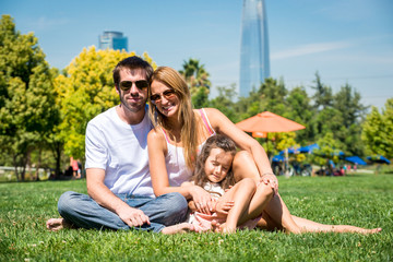 Young happy family on the park