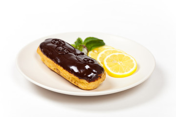 Homemade eclair with cream