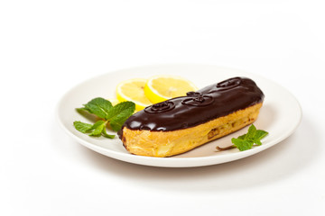 Homemade eclair with cream