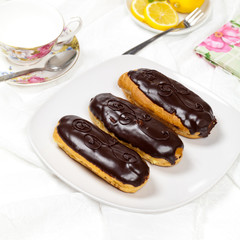 Homemade eclairs with cream