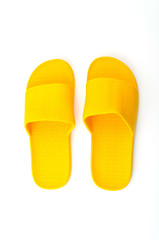 Yellow slippers isolated white background