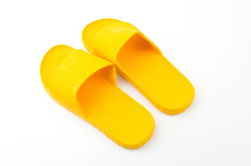 Yellow slippers isolated white background