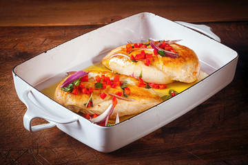 Roast chicken breasts in an oven dish
