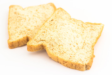 Fototapeta na wymiar Brown bread slice isolated on white background