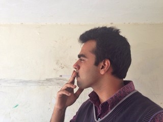 man smoking cigarette