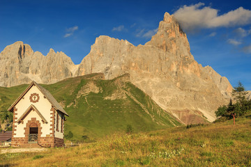Fototapeta na wymiar Typical Tirolian chapel in the Dolomites,Cimon Della Pala,Italy