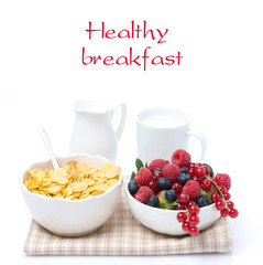 assorted fresh berries, corn flakes and milk, isolated