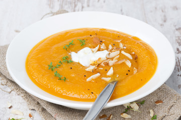 carrot soup with almonds, yogurt and watercress