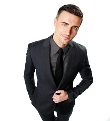 Confident businessman standing isolated on a white background