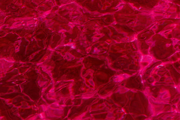 red abstract background of water surface