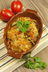 tuffed cabbage with sauce decorated with parsley