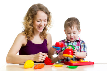Obraz na płótnie Canvas mom and child boy playing together