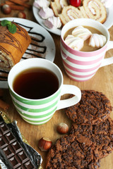 Cup of tea and sweets close up
