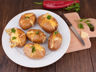 Baked potato with cheese and butter
