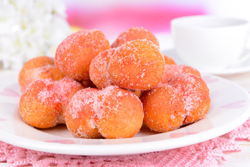 Delicious cookies peaches on table on light background