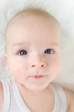 adorable portrait of a cute baby on white background
