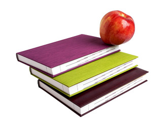 Concept of education. A red apple on top of a stack of the books