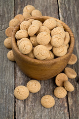 Traditional italian almond cookies - amaretti, on wooden surface
