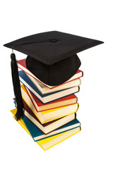 Doktorhut auf Bücherstapel