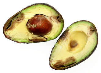 Overly Ripe Avocado Sliced with Seed Over White