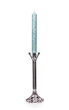 Glass candlestick with turquoise candle