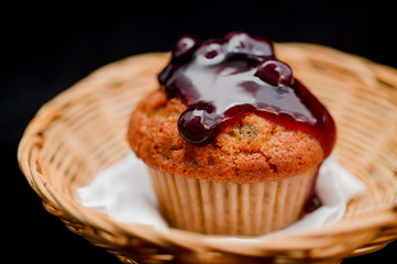 Blueberry cupcake on white background