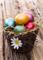 Easter eggs on wooden background