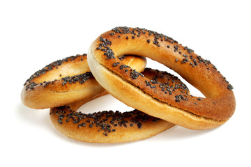 Bagels with poppy seeds isolated on white background