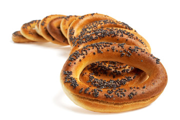 Bagels with poppy seeds isolated on white background