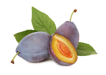 Ripe plums with green leaves (isolated)